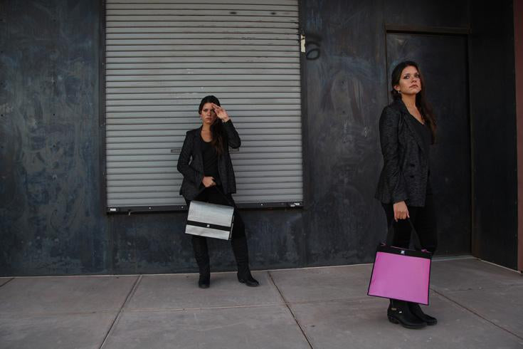 two women with bags